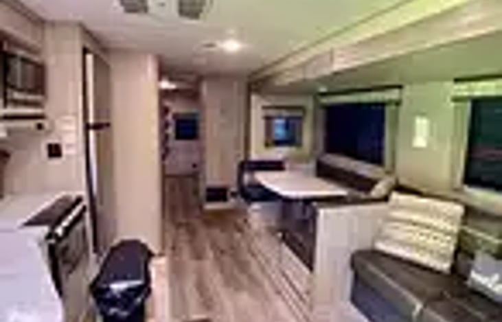 Living room with fold out couch and table