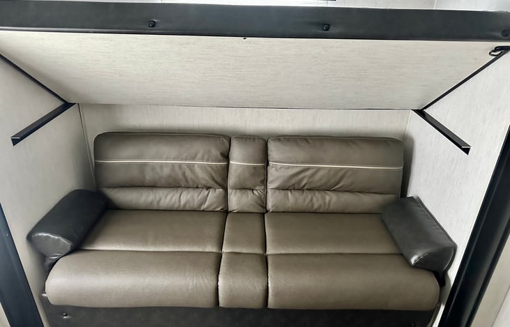 Jack knife sofa is full size for additional sleeping area. There are two of these- one in the bunkhouse and one in the living room area