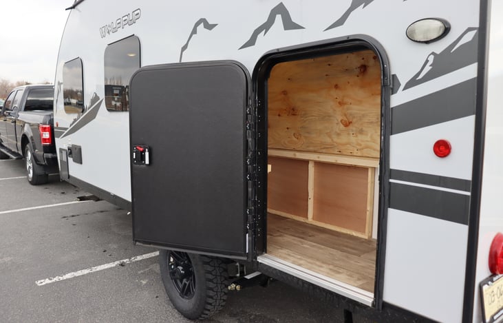 Large storage "shed" under bunks with exterior access. Great for bikes or other large items.
