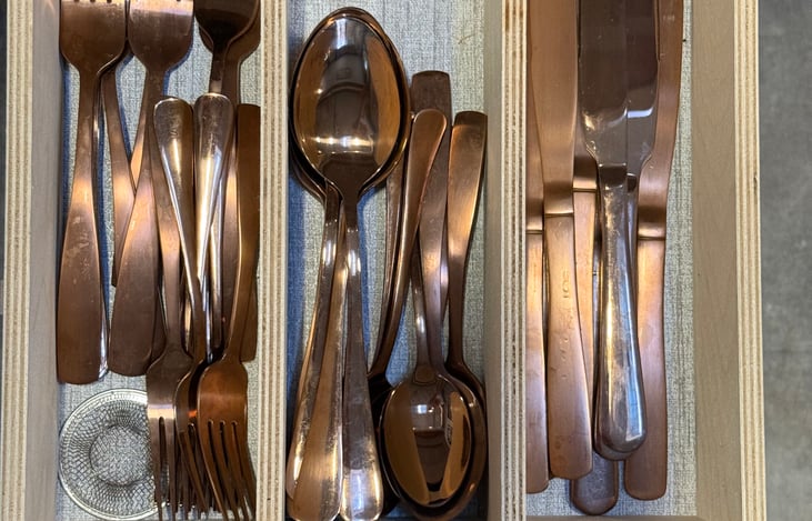 Full silverware set provided for your group, including forks, knives, spoons, and steak knives.