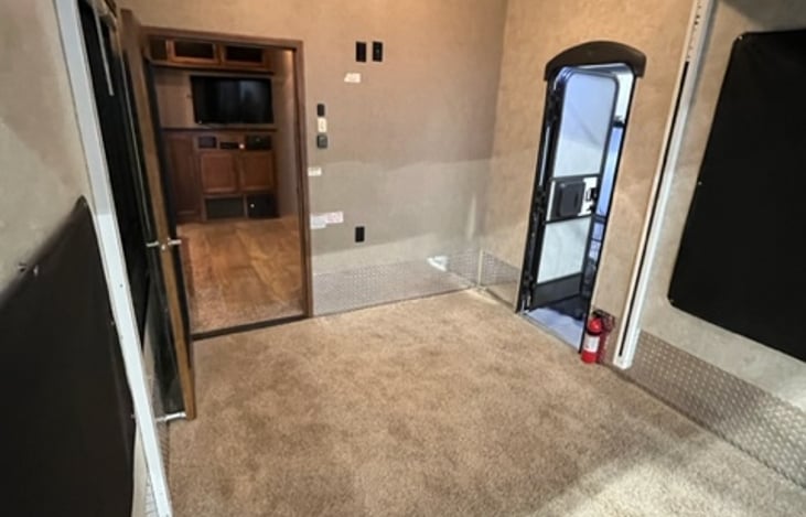 Rear bedroom/garage area. This picture is with the Upper bunk fully raised and out of the way!