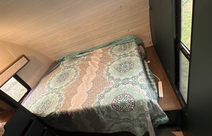 Master bedroom we rebuilt to fit a queen bed for comfort and a closet.