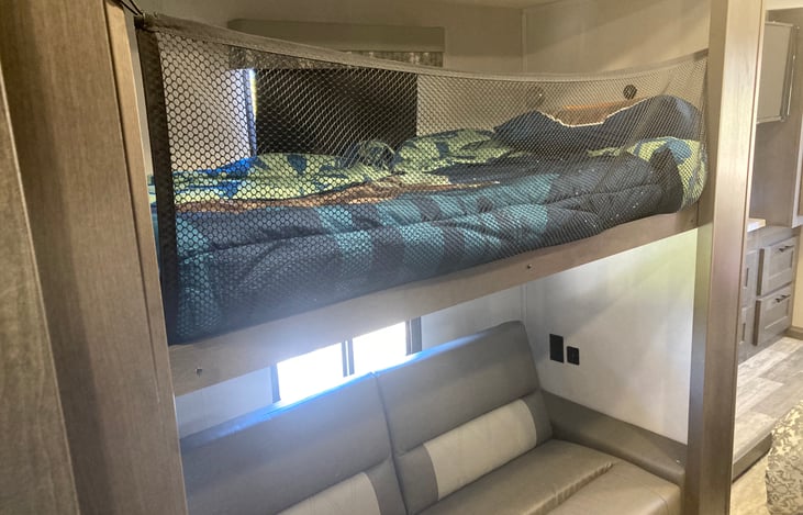 Bunk beds - twin top, double bottom that also converts to a sofa