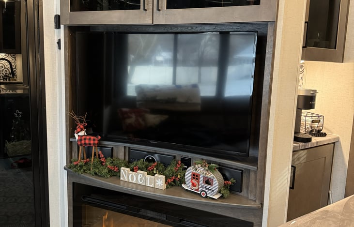 Main smart TV and fireplace