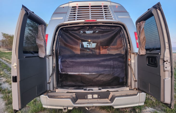 Enjoy the outdoors, Indoors, with wide opening back doors with a screen to keep those skeeters out.