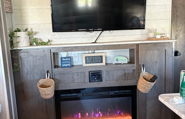 Cozy fireplace in main area for ambience or heating purposes. Remote control