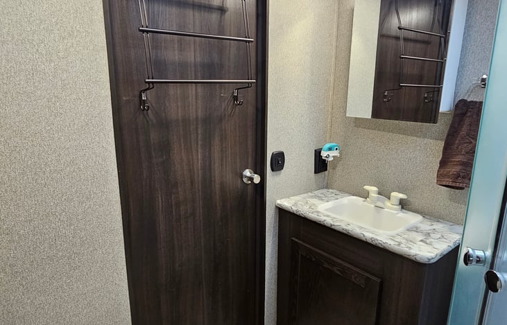 Main bathroom - door to hallway (closed)