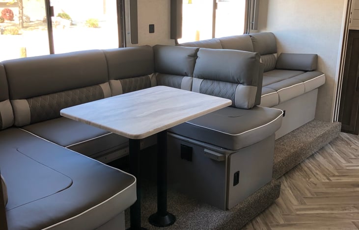 Kitchen table breaks down into another bed