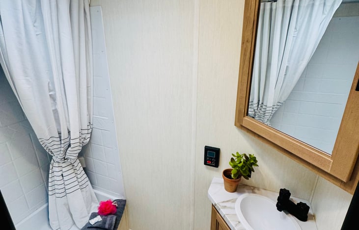 Look at the Size of this Full Bath.....enjoy a loooong hot shower with the on-demand hot water heater.