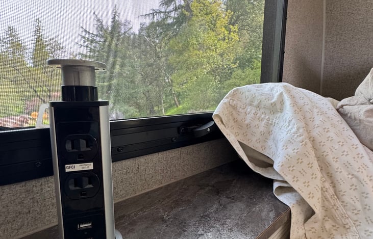 Pop up electrical near the bed