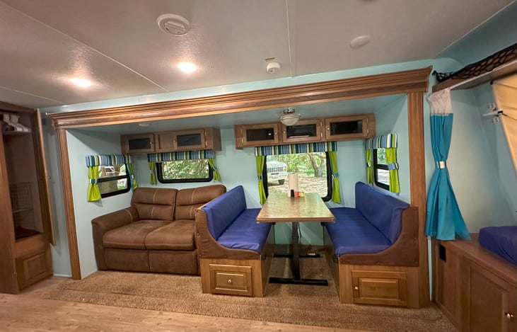 The comfortable love seat folds out to a full sized bed for additional sleeping. The kitchen table is convertible as well.