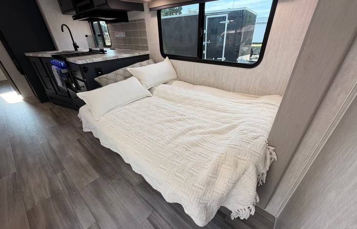 Main living room couch converted to the bed format.