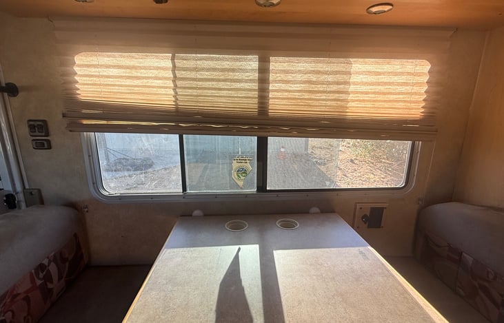 Large windows on both sides—bright, open feel with great views wherever you park 🌄🚐
