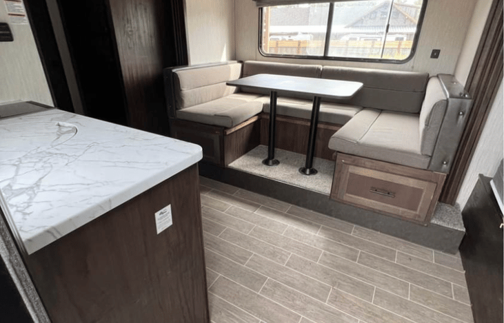 Dinking area that converts to more sleeping space.