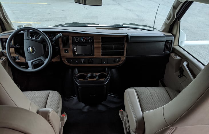 Navigation and Rear Camera that you can use while driving! The seats are clean and comfy! Inverter in the dash and 2 12v sockets for gadgets.