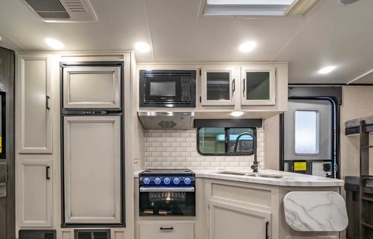 Pans, dishes and utensils included.