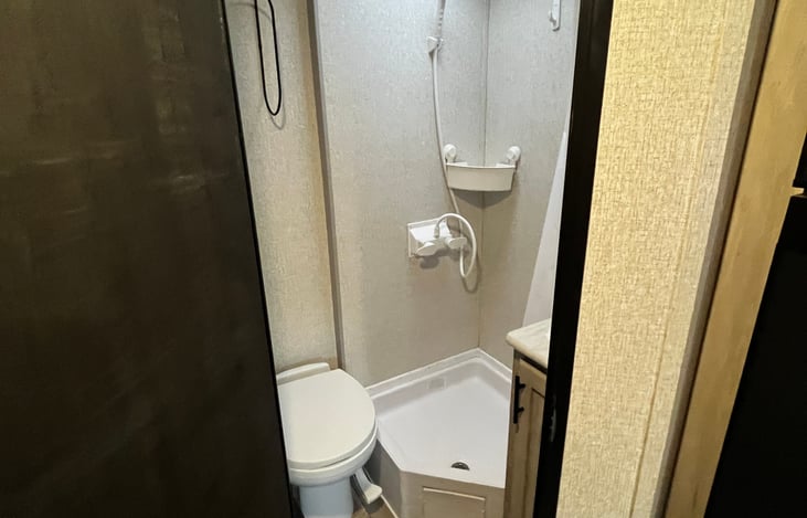 fully functional toilet and shower. toilet paper included