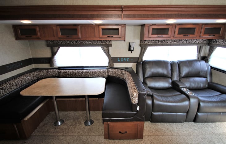 Wonderful dinette that turns into a bed, with two brand new recliners
