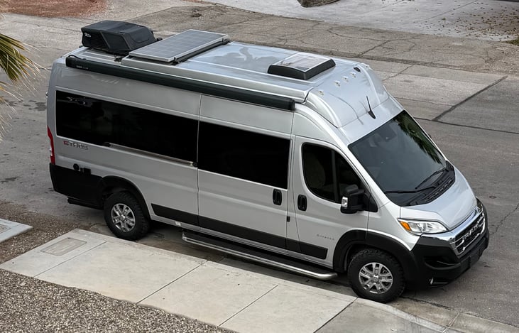 sun roof, solar, air conditioner and pop up ten on top