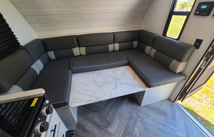 Convertible dining sleeps one comfortably or two small children. See the next photos for reference.