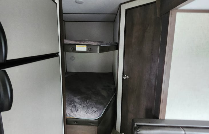 Full sized top and bottom bunks