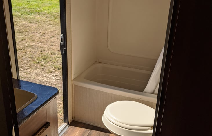 BATHROOM WITH SINK, TOILET, TUB & SHOWER
