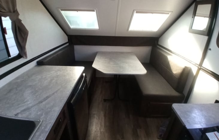 Dinette converts to additional bed for two