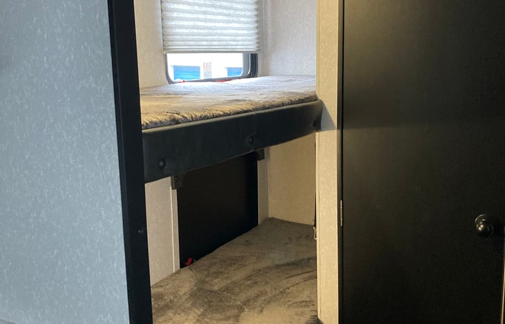 Jake's top and bottom bunks offer a great place for the kids to have their own space. The bunks feature comfy "teddy bear" mattresses.  Both bunks have a light and a built in USB charging station.