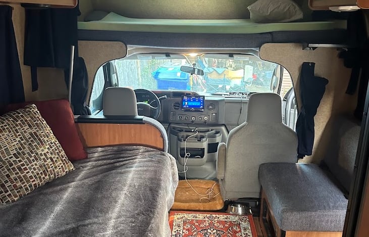 I'm 5'6" and I can comfortable sleep on the dinette bed fully stretched out.