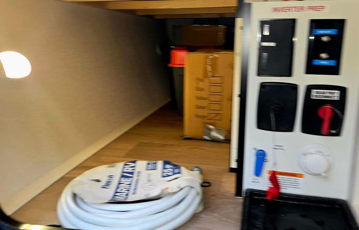 Area outside that goes all the way to other side. Has motion light/or stay on or off. Have all hoses just not in photo.