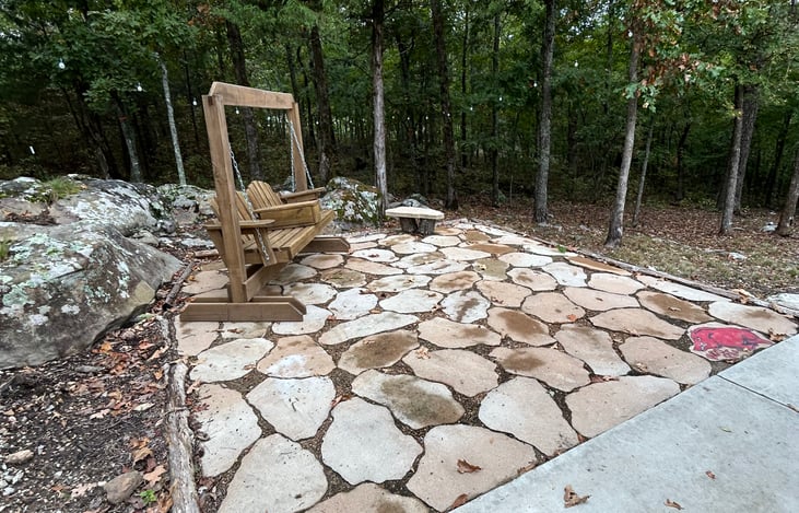 This lighted patio is behind the camper.