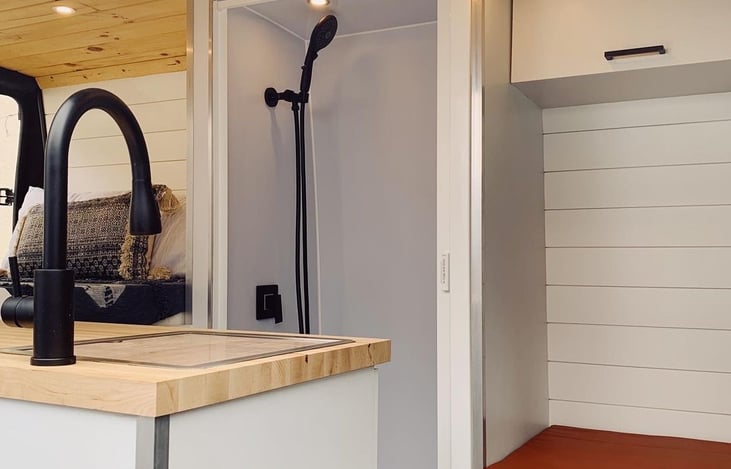 Work area, shower and kitchen sink