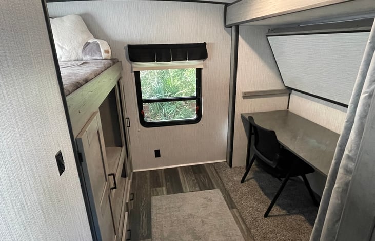 Can be a workstation or can remove desk and chair for another bed