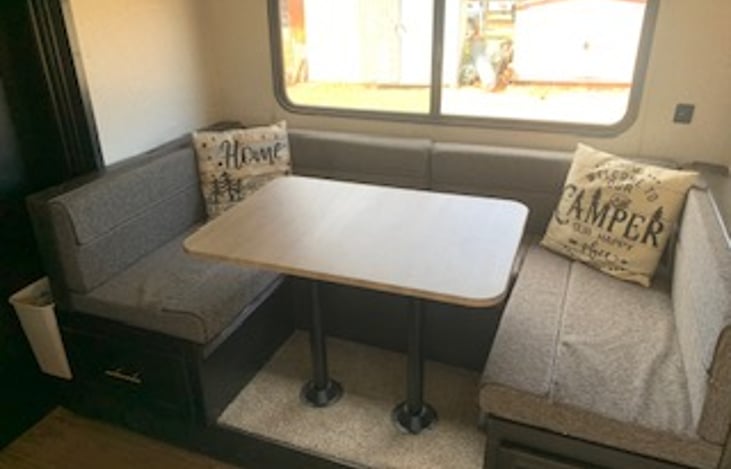 Dining area to sit and ponder the gorgeous outdoor setting and drink your morning coffee. This area also converts to a comfy bed.