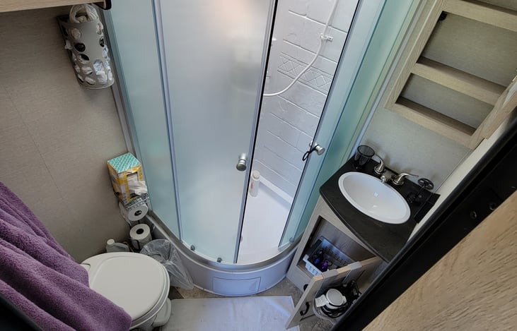 Bathroom comes equipped with linens, hair dryer, special RV TP, soaps.