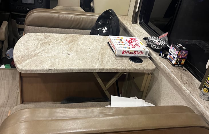 Dinner table, converts to bed for one adult or two kids.