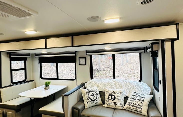 Living and dining room that can be converted to two beds.