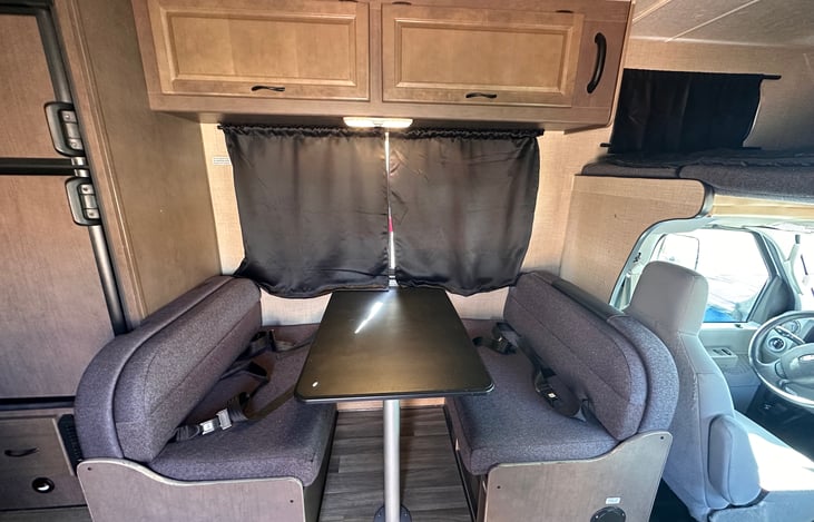 Table turns into a bed that sleeps 1 adult or 2 small children.