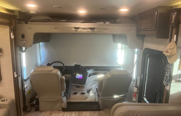 Raised loft bed above cockpit.