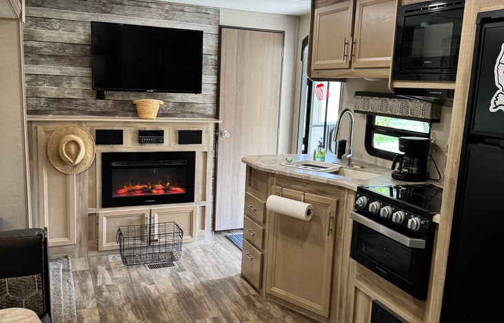 The primary bedroom is split design and right off the exterior door