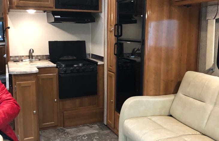 Kitchen & 1/3 of leather sofa