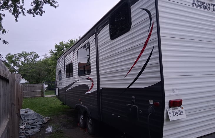 Left side of trailer (where slide out is)