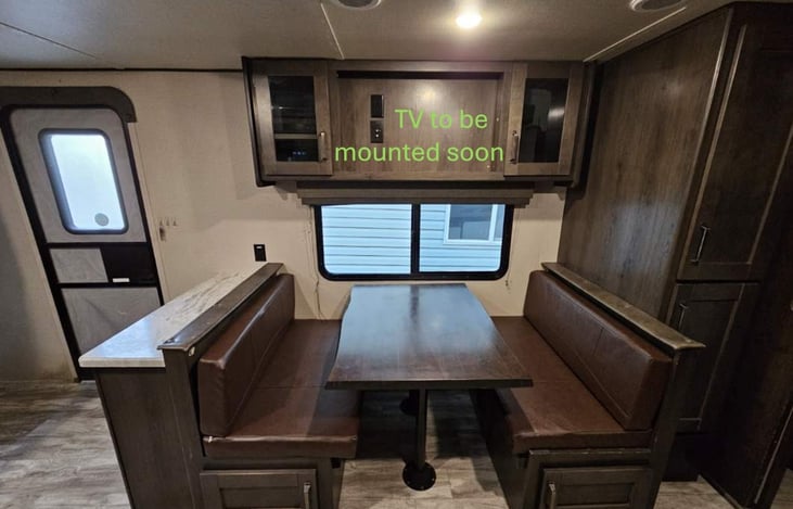 Dining area that can be converted into a sleeping area. TV coming soon.