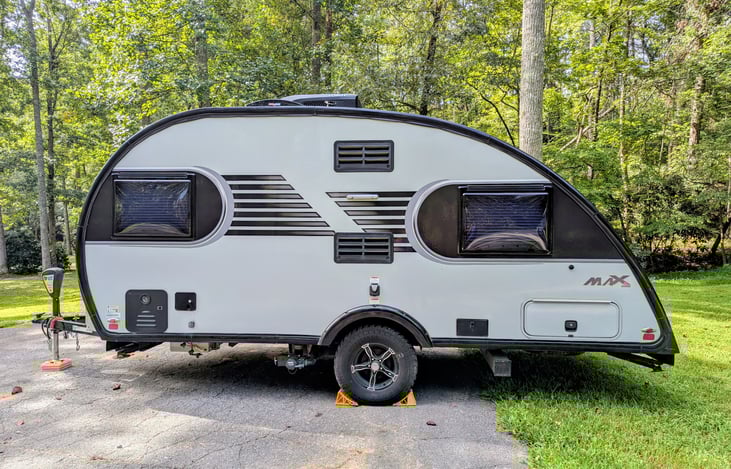Rugged, cozy and classy, this easy-to-tow 2021 Little Guy Max is loaded with features and accommodations including Rough Rider package, solar, solid wood cabinetry, Queen bed, pop-out windows & more.