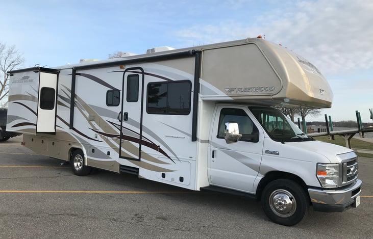 Rear queen bed slide out in open position