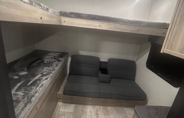 Three bunks and the couch folds down