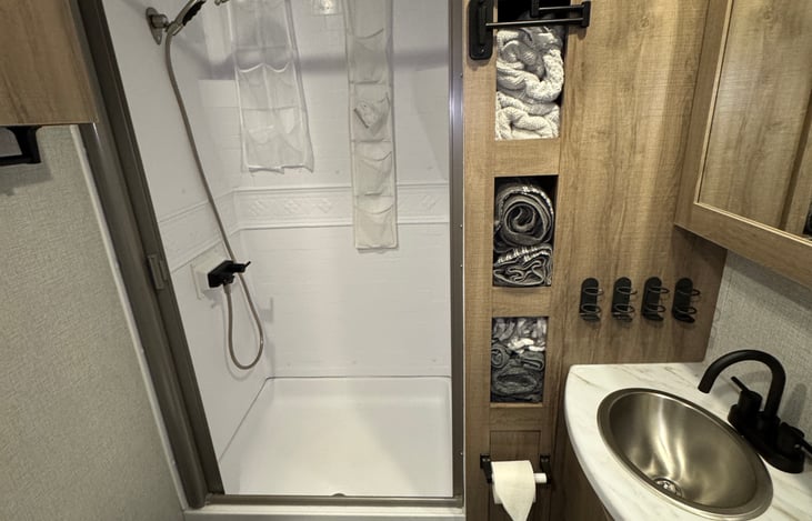 Comfortable shower with upgraded shower head, towels for up to six guests, and soap and shampoo so you have everything you need.