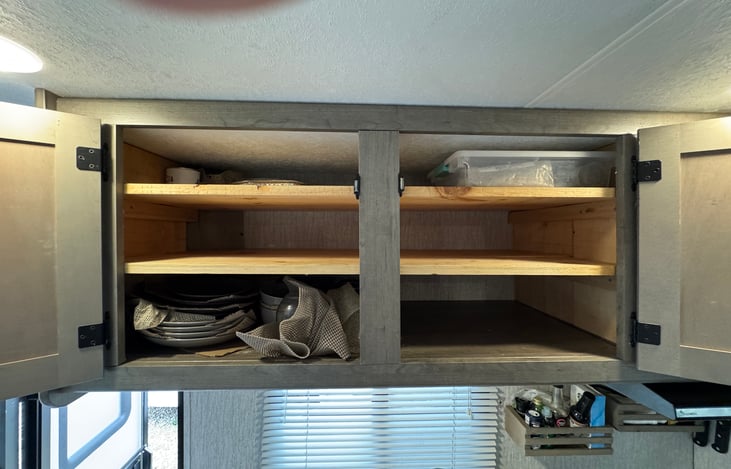 Over the counter storage with dishes