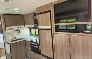 Fun AND Games in a comfy towable land yacht!