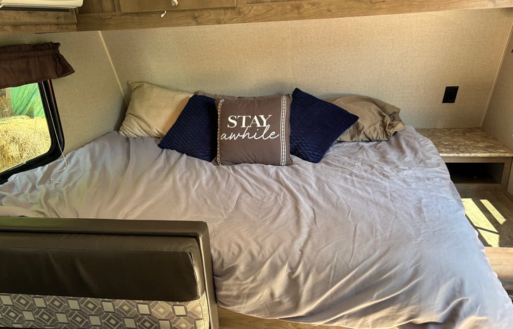 Queen bed with 2 inch mattress pad